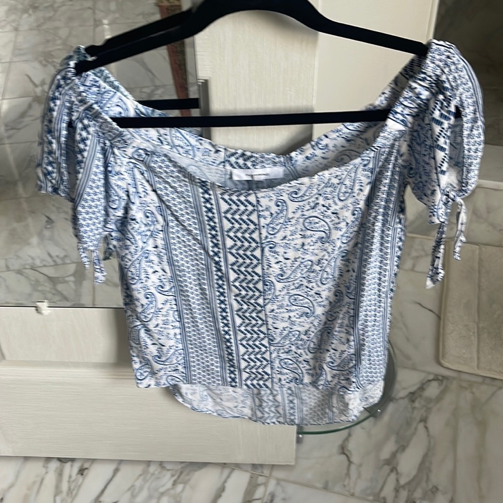 cute top great with jeans longer in the back navy cut out sleeves